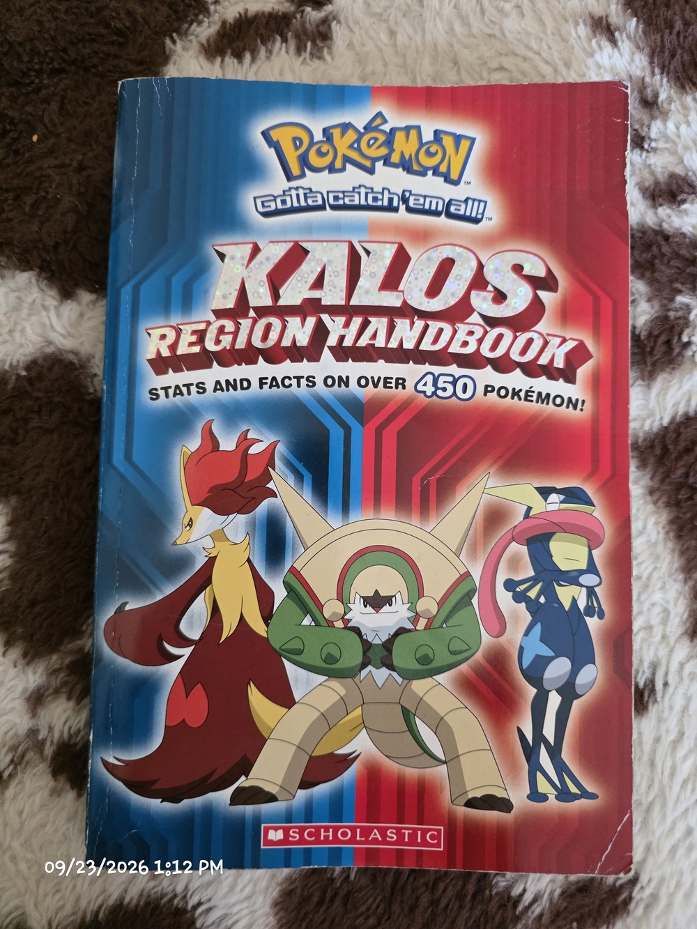 Scholastic Pokémon Kalos Region Pokemon Kalos Region Handbook - Blue & Red Cover